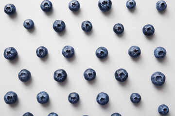 Many ripe blueberry on white background, closeup