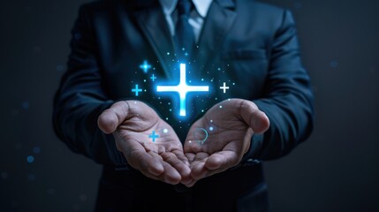Businessman holding virtual blue plus sign for positive thinking mindset or health insurance symbol concept for mental rejuvenation