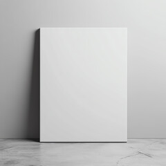Minimalist empty canvas leaning against a white wall, perfect for artwork mockups and design presentations.