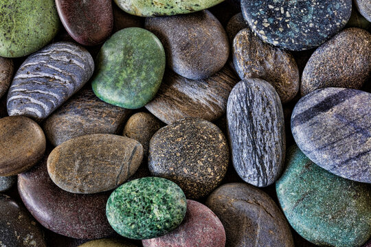 USA, Washington State, Seabeck. Smooth beach rocks. Credit as: 