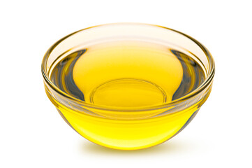 Glass bowl of vegetable oil isolated on white background.