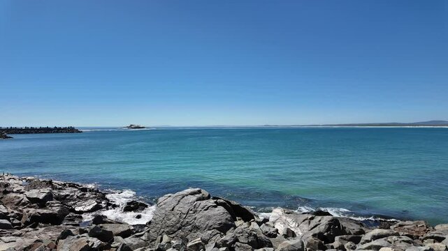 Yzerfontein Western Cape South Africa. 27.03.2024. Video. Yzerfontein rocky foreshore with tide coming in over the bay and 16 mile beach. West coast South Africa.