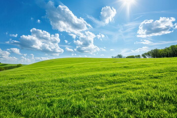 Smooth meadow on the hill with blue sky, beautiful landscape