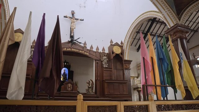 Church interior in Sri Lanka with statues and sculptures
