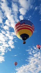 Fototapeta premium Blue sky and white clouds, hot air balloon with American flag, hot air balloon close-up,