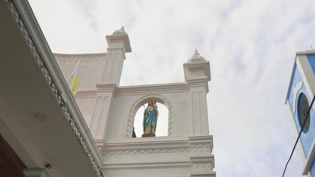 Panning footage of church buildings and structures in a holy church land in Sri Lanka 
