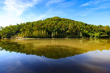 Serene Lake with Verdant Hills Reflecting in Water, Lau Shui Heung Reservoir, Hong Kong