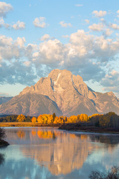 USA, Wyoming, Grand Teton National Park, Mt. Moran is reflected in the Snake River in autumn.