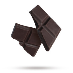 Pieces of sweet chocolate falling on white background