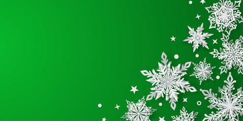 Christmas illustration with beautiful white complex snowflakes with soft shadows on green background