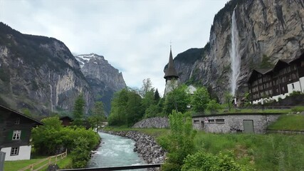 Lauterbrunnen is beautiful village heaven liked where have surrounding with mountain and a lot of waterfalls in switzerland