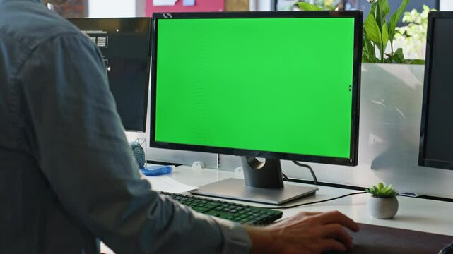 Office guy using chromakey computer closeup. Worker hand holding mouse device