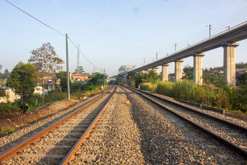 Two railway lines on a bright morning