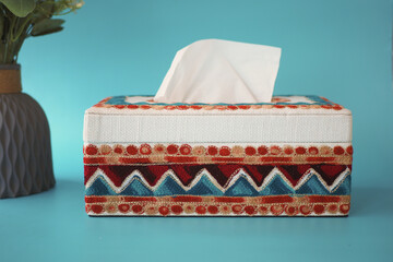 A beautifully designed Decorative Tissue Box Cover displayed on a vibrant and bright backdrop