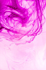 abstract background of pink and purple ink splashing on white background