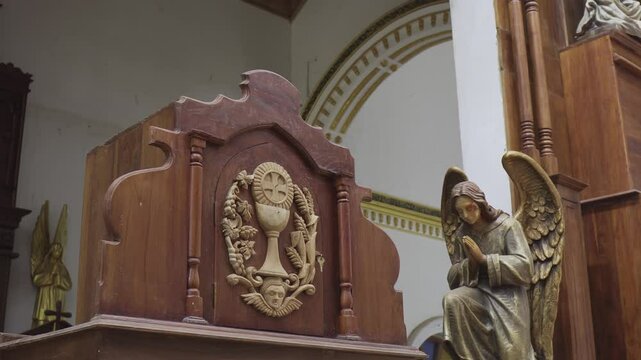 Church interior in Sri Lanka with statues and sculptures
