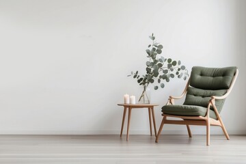 Green Armchair and Eucalyptus Branch in a Minimalist Interior