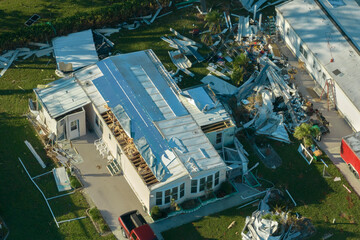 Destroyed by hurricane strong winds suburban houses in Florida mobile home residential area....