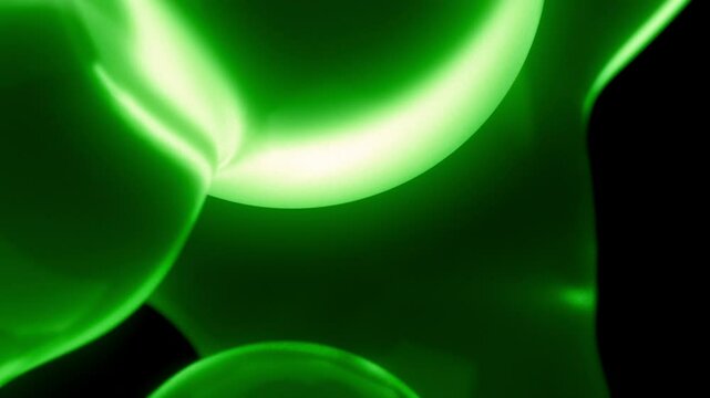 Lava lamp neon green satisfying metaball bubbles floating as full screen background. Macro close up depth of field concept 3D animation backplate of elegant abstract decorative soothing oil balls.