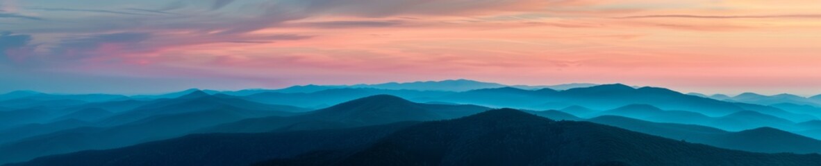 Fototapeta premium Expansive sunrise view of mountain range, Natural beauty.