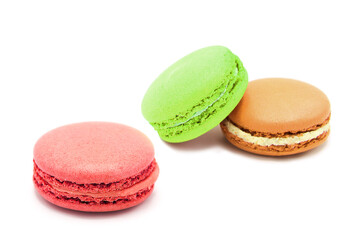 Sweet colorful varied assortment macarons cookies with filling isolated on a white background. Handmade traditional sweets. Clipping Path.