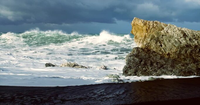 Heavy Waves Crashing on the white rock at new zealands coast