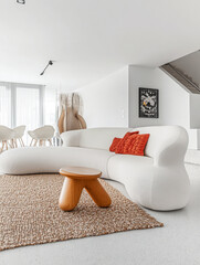 Modern minimalist living room interiors with bold furniture and decor. Luxury residential Real Estate interior design composition.