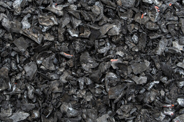 Fresh coal close up with white dust
