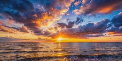 Obraz premium Sunset over the sea on a spring cloudy evening, sunset, sea, spring, cloudy, evening, horizon, nature, sky, water, calm, peaceful