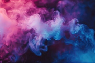 Obraz premium A hazy cloud of blue and pink smoke fills the air, creating a misty atmosphere
