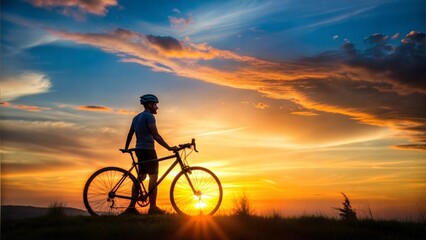 Obraz premium Cyclist resting silhouette at sunset. active outdoor sport concept