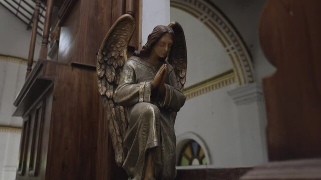 Church interior in Sri Lanka with statues and sculptures
