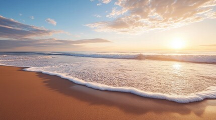 Fototapeta premium A wide, sandy beach at sunset with gentle waves rolling in, leaving plenty of space for text. Perfect for vacation, relaxation, or summer