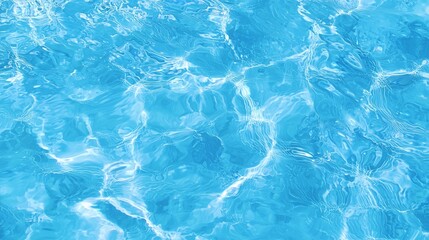 Obraz premium Bright blue pool water texture with sunlight reflections creating a calming and refreshing visual.