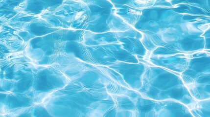Obraz premium Clear blue water with light reflections creating a wavy pattern. Symbolizing relaxation and aquatic activities.