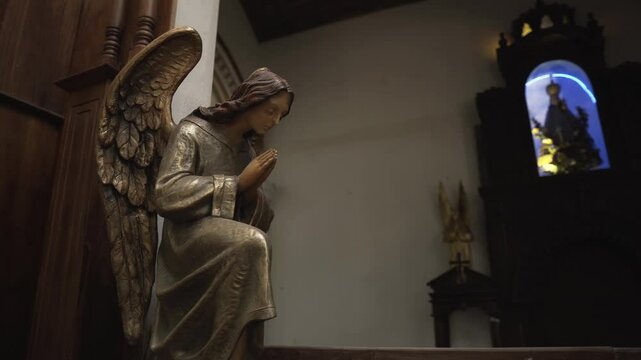 Church interior in Sri Lanka with statues and sculptures

