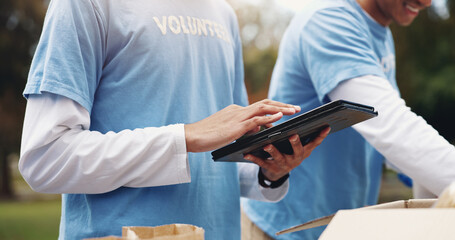 Tablet, volunteer and hands of people in park for charity event, community service or teamwork....