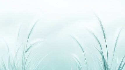 A field of grass with a blue sky in the background