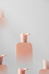 A pink mock-up of a cosmetic product with a place for a logo with a distortion effect. 