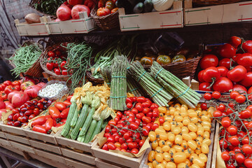 Traditional fruit and vegetable shop in the historic center of Florence, Tuscany bustling with local produce