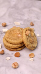 The cookies are golden brown with a slightly crispy edge and a soft, chewy center. Some cookies have chocolate chips