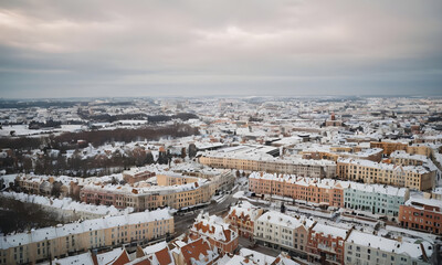 Naklejka premium Riga cityscape covered in snow on overcast winter day