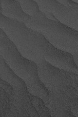 Abstract pattern made due to wind erosion on shifting sand dunes.