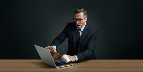 Office Disaster : Man Accidentally Spills Coffee on Laptop