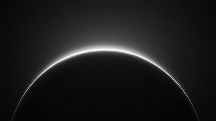 A minimalist black background with a faint gradient, simulating the effect of a solar eclipse with a subtle glow at the horizon.