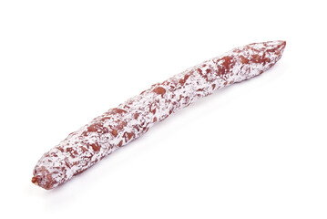 Traditional Spanish Fuet thin dried sausage, Close-up, isolated on a white background.