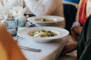 Elegant dining at a wedding with beautifully served plates
