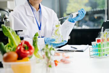 Fototapeta premium Food science as lab scientists test and analyze vegetables for safety and quality using advanced technology