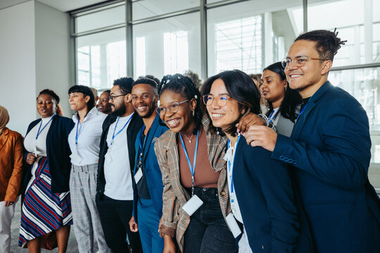 Conference staff posing for a group photo at a professional gathering