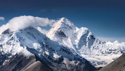 Obraz premium Snow covered Mountain in the Himalayas with Clouds. panorama of the mountains.